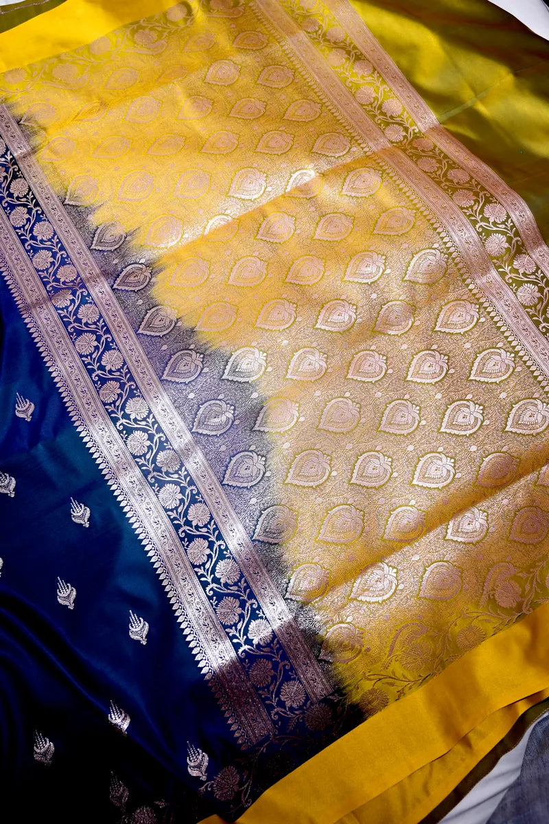 Peacock Blue Banarasi Katan Silk Saree with Silver Zari Butis & Floral Border (RLSS-269)