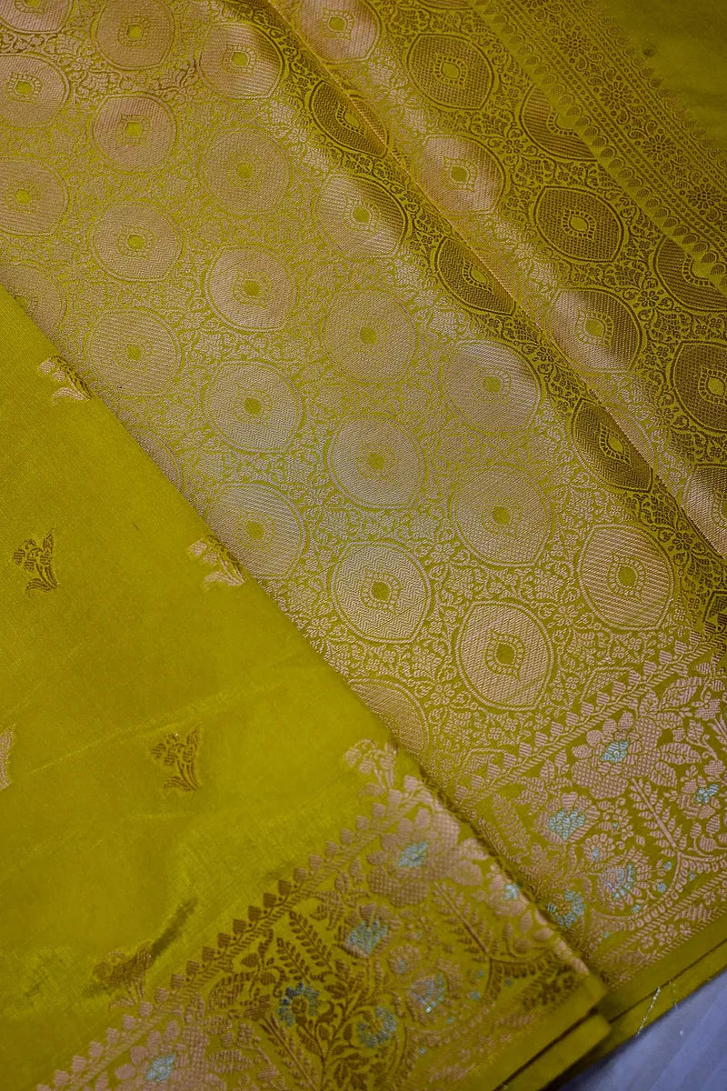 Olive Green Banarasi Silk Saree with Silver Zari Floral Bootis & Intricate Border(RLSS-232)