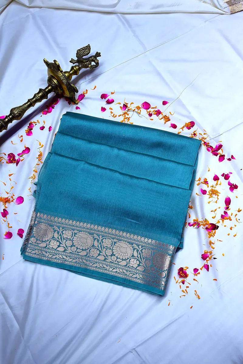 Vibrant Teal Silk Saree featuring Classic Woven Zari Border & Textured Body(RLSS-210)