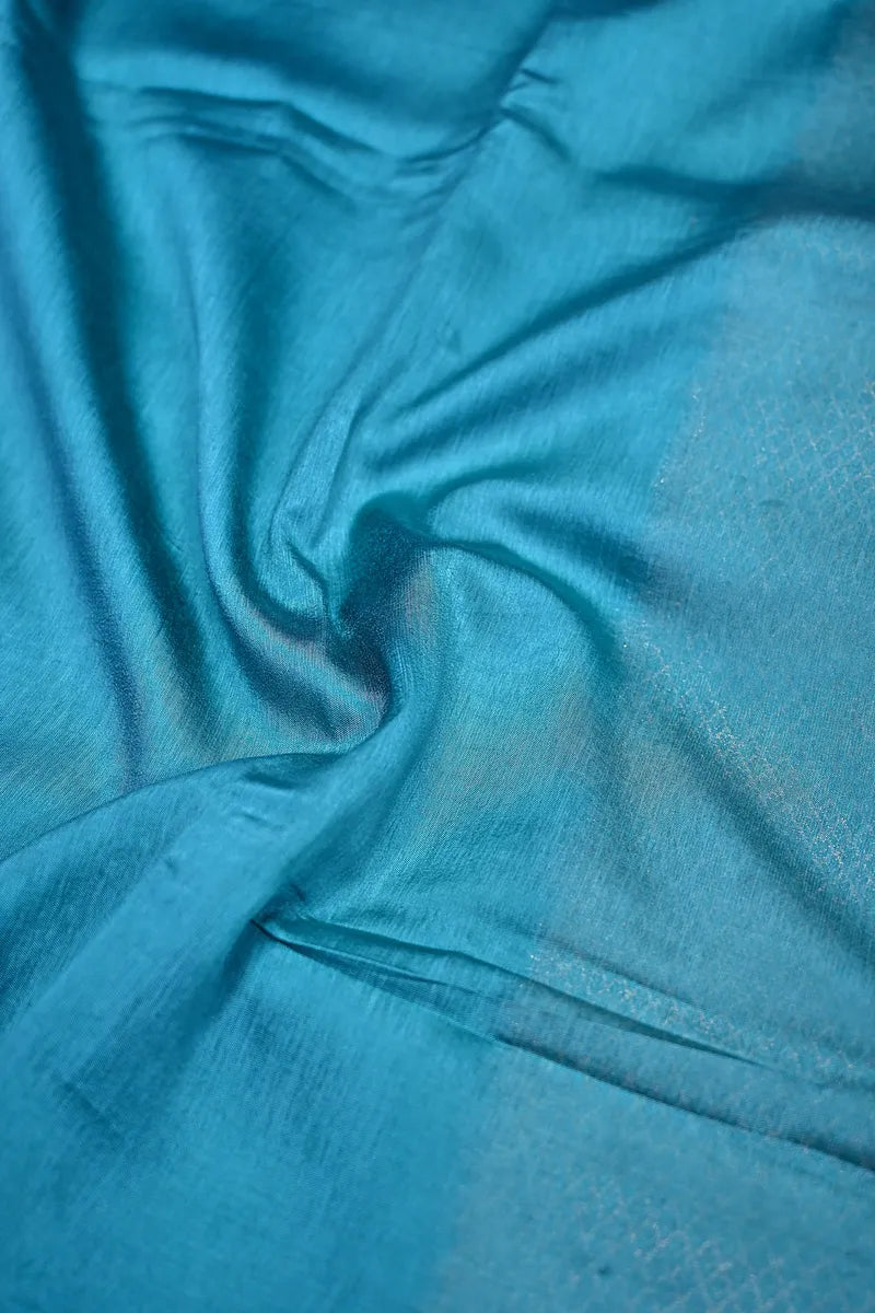 Vibrant Teal Silk Saree featuring Classic Woven Zari Border & Textured Body(RLSS-210)