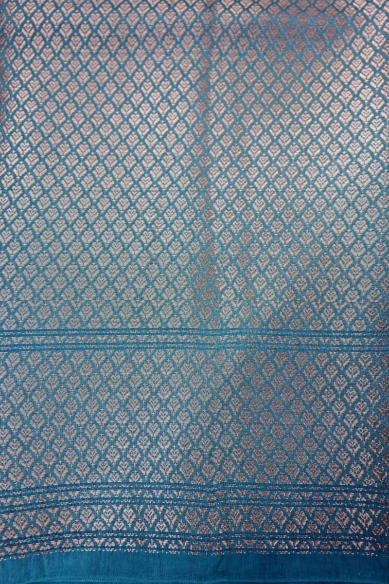 Vibrant Teal Silk Saree featuring Classic Woven Zari Border & Textured Body(RLSS-210)