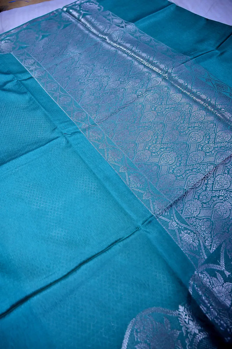Teal Blue Banarasi Silk Saree with Silver Zari Scalloped Floral BorderRLSS-194)