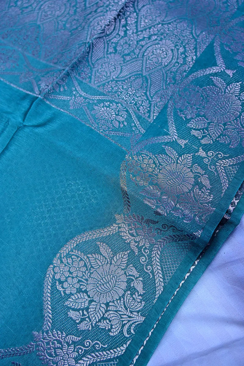 Teal Blue Banarasi Silk Saree with Silver Zari Scalloped Floral BorderRLSS-194)