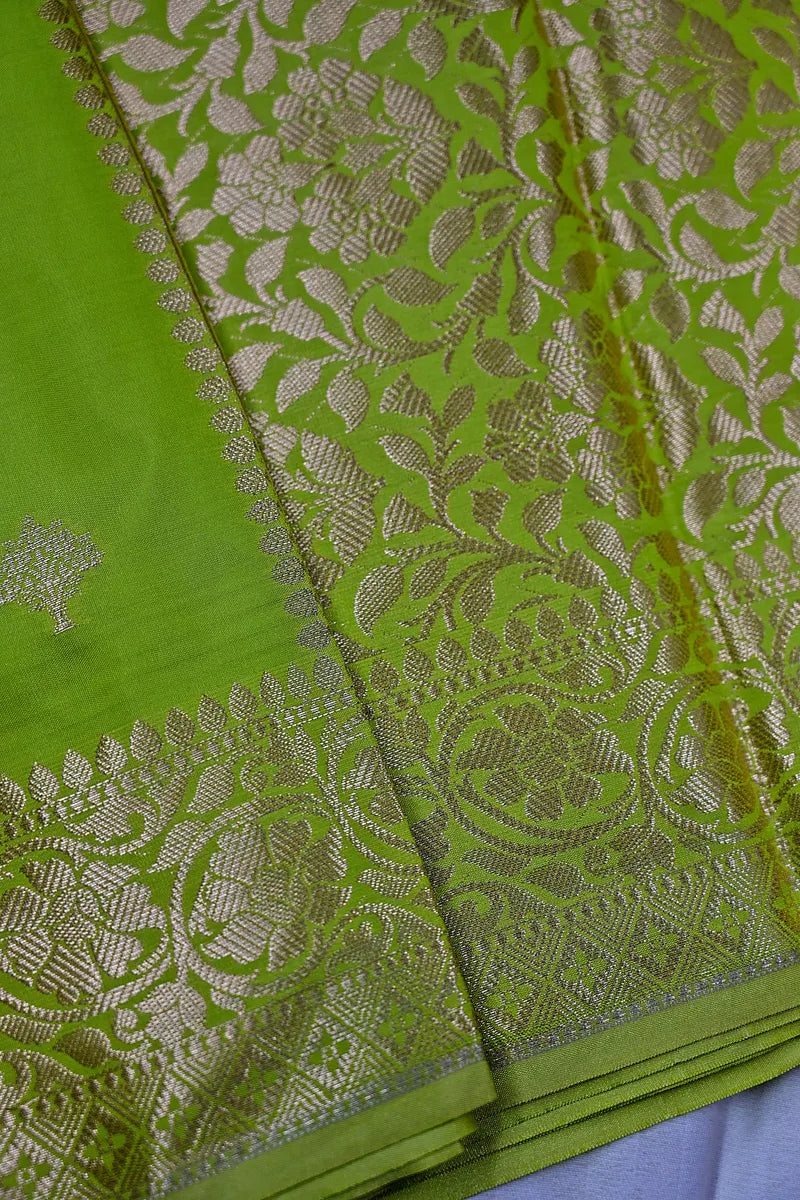 Vibrant Olive Green Silk Saree with Fine Silver Zari Weaving & Royal Border(RLSS-162)