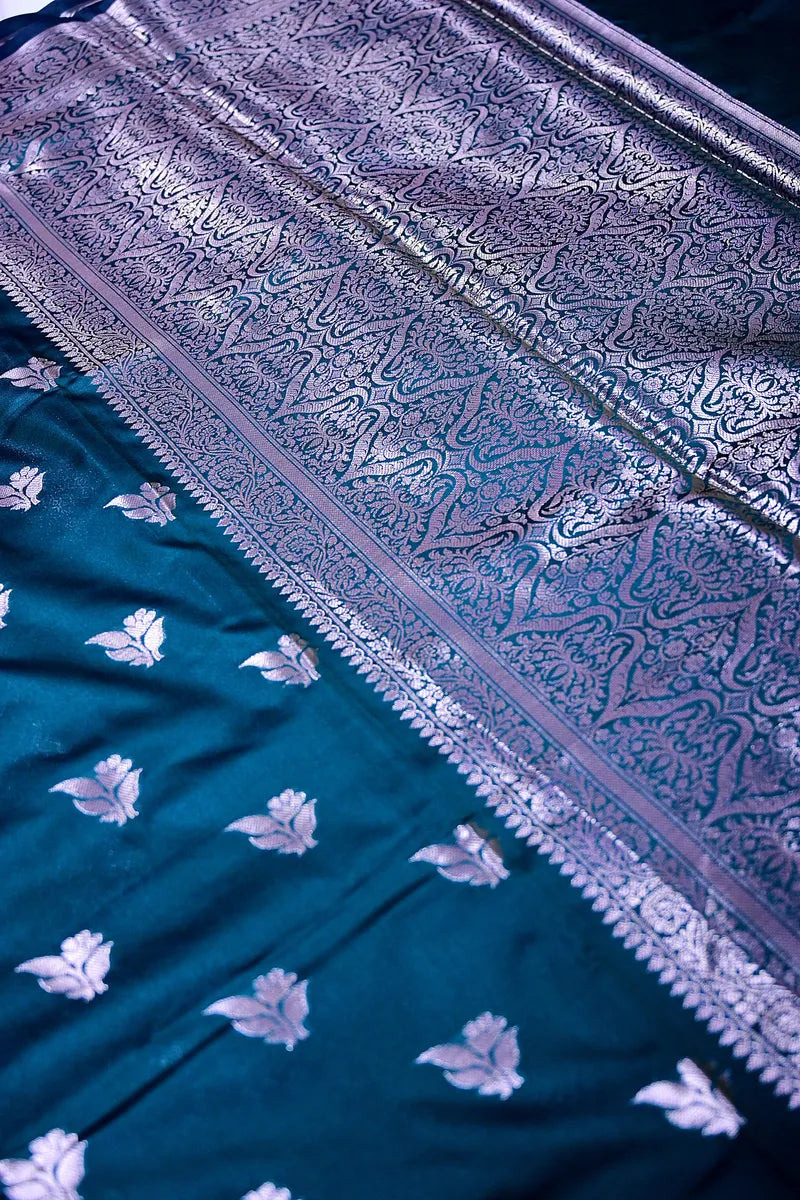 Royal Teal Blue Soft Silk Saree with Silver Zari Weaving Floral Border & Floral Motifs(RLSS-154)