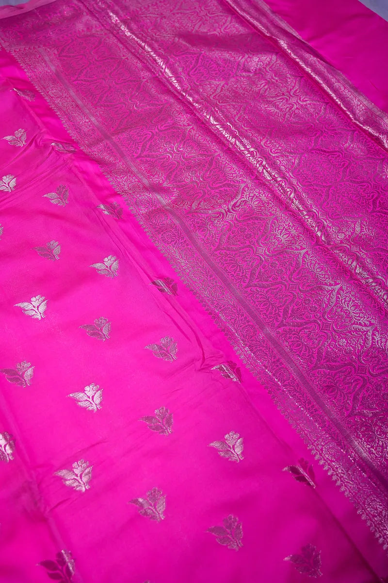 Vibrant Rani Pink Silk Saree with Silver Zari Floral Bootis and Rich Woven Border(RLSS-156)