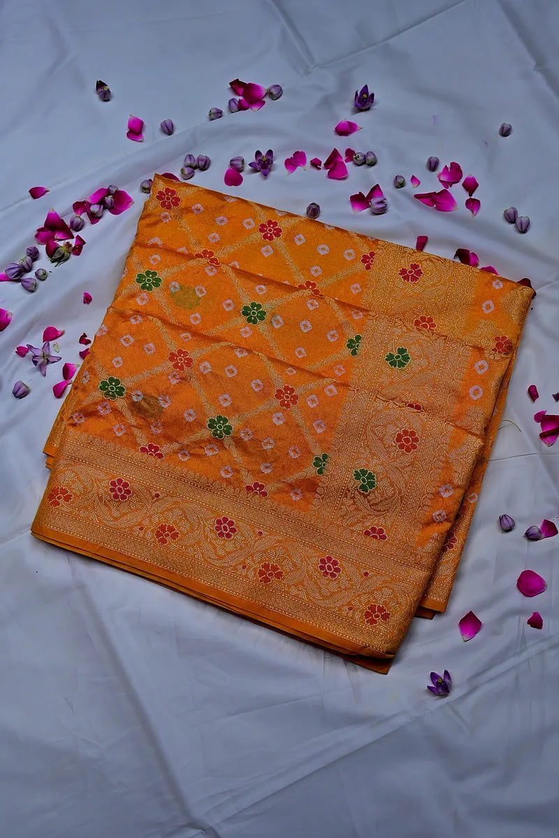 Mustard Orange Bandhani Silk Saree with Gold Zari Jaal & Colorful Meenakari Floral Border(RLSS-169)