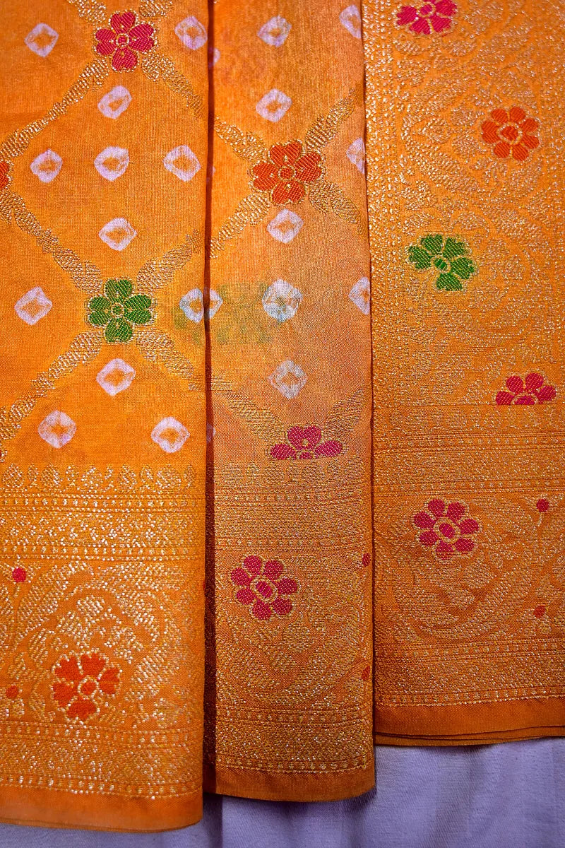 Mustard Orange Bandhani Silk Saree with Gold Zari Jaal & Colorful Meenakari Floral Border(RLSS-169)